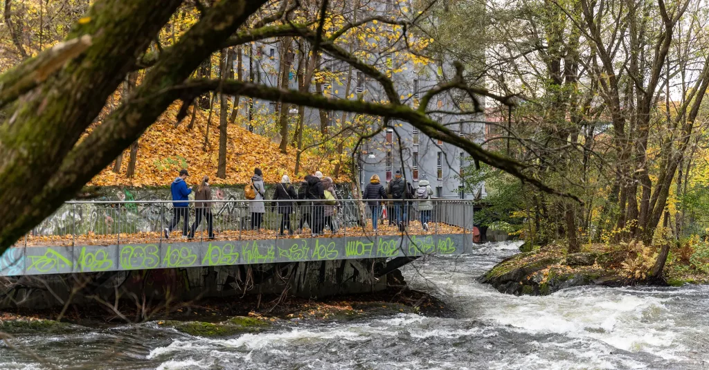People walking along the Aker river. Photo by: Maverix - Visit Norway